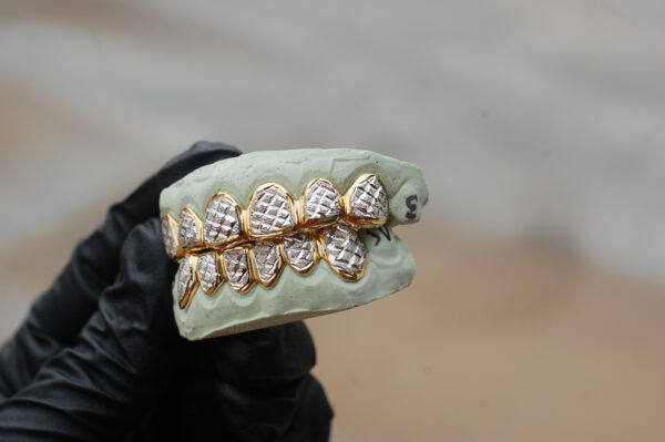 Yellow and White Gold Diamond Dust Cut Punchout Grillz - GotGrillz