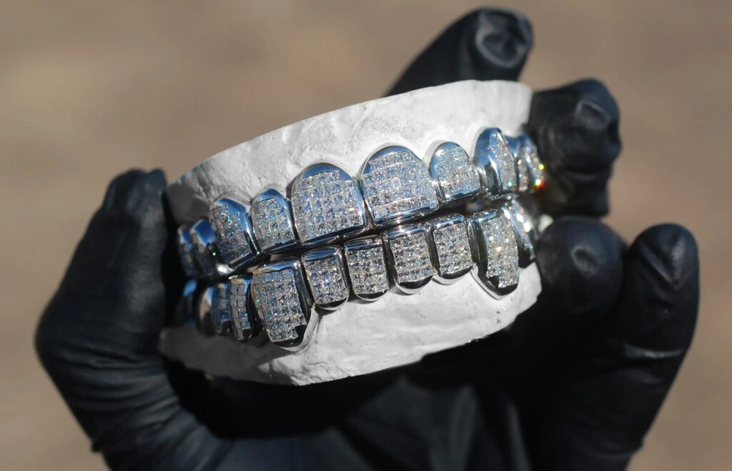Custom Grillz Houston GotGrillz custom gold teeth grillz houston